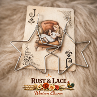 Star-shaped earrings on a playing card with 'Rust & Lace' branding.