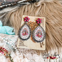 Style like a saint with the Mother Mary Earrings! Stand out from the crowd with this unique 2.25" accessory, complete with a sparkling rhinestone accent. Make a bold statement and show off your daring style!