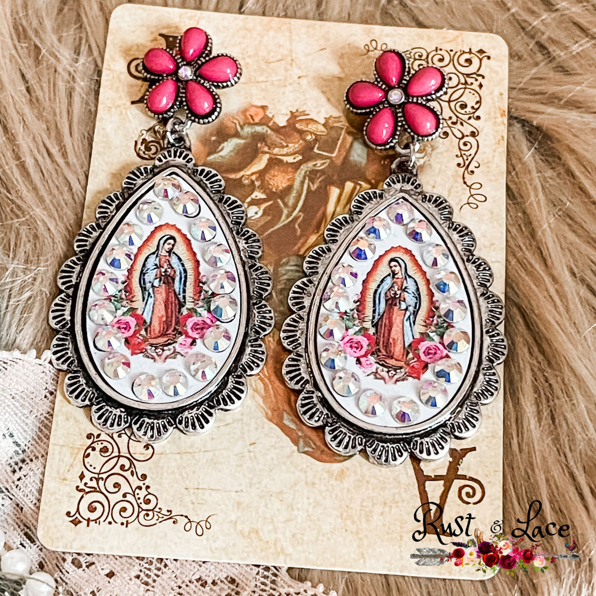 Style like a saint with the Mother Mary Earrings! Stand out from the crowd with this unique 2.25" accessory, complete with a sparkling rhinestone accent. Make a bold statement and show off your daring style!